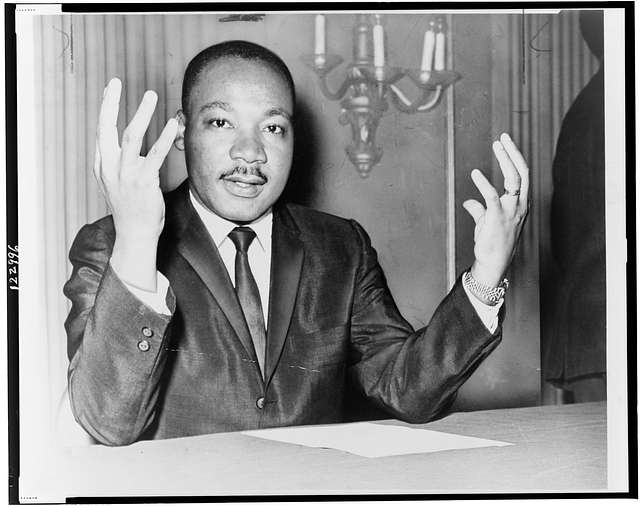 rev martin luther king head and shoulders portrait seated facing front hands - 10 Ways to Transform Negative into Positive Thoughts.